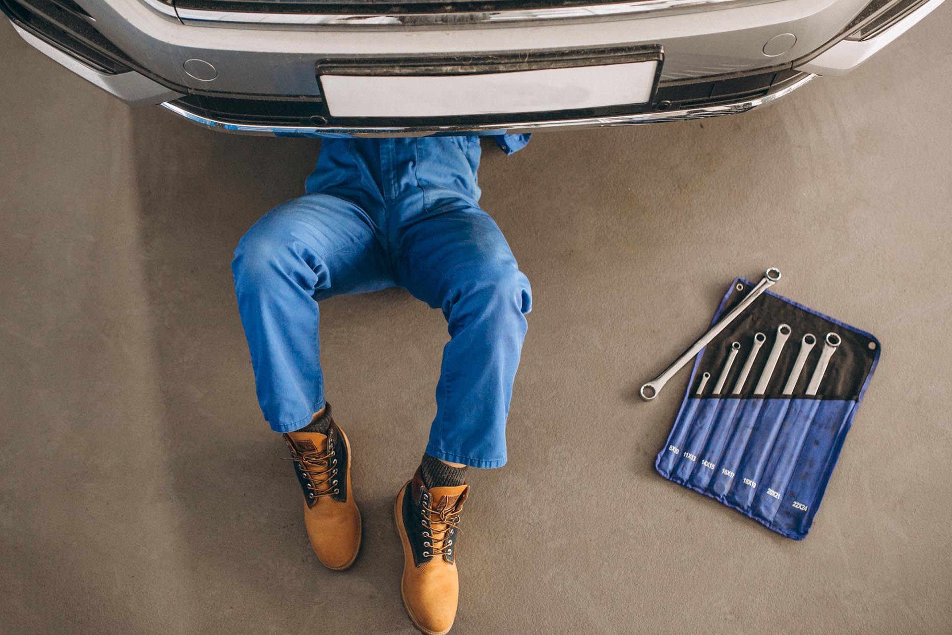 auto-mechanic-checking-car (1) auto-mechanic-checking-car (1)